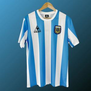 Historic Argentina 1986 home football shirt, featuring iconic stripes and classic design